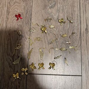 Lot of 29 vintage gold music instruments and bow Christmas ornaments miniature